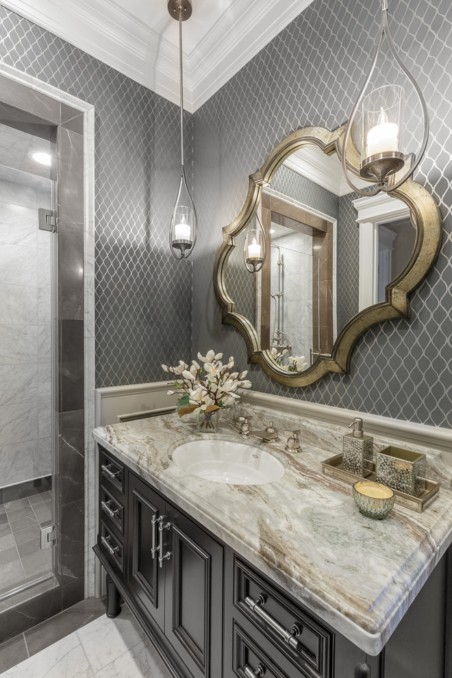 Mid-sized traditional 3/4 bathroom in San Francisco with recessed-panel cabinets, dark wood cabinets, an alcove shower, gray tile, white tile, stone tile, grey walls, marble floors, an undermount sink, marble benchtops, white floor and a hinged shower door.