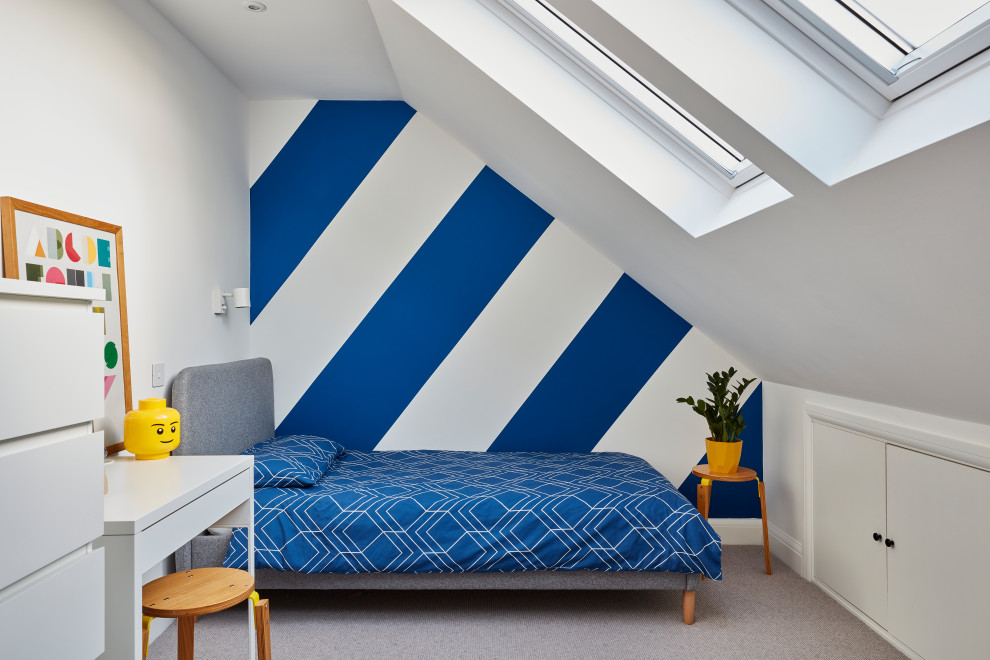 Mid-sized contemporary kids' room in London.