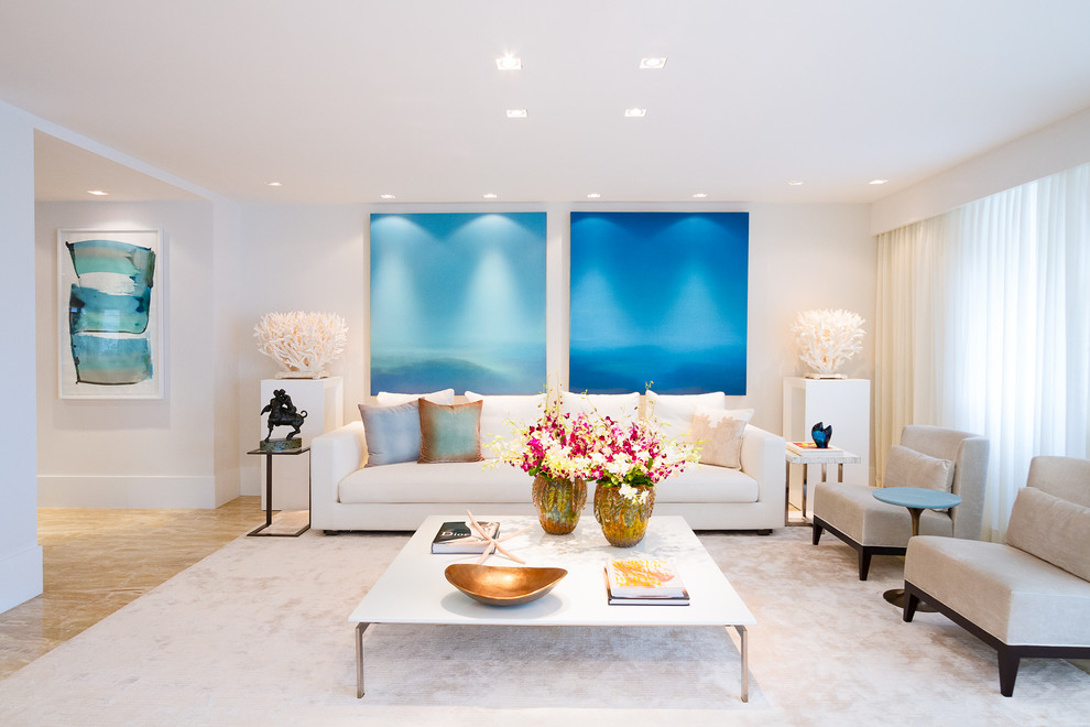 Inspiration for a transitional formal living room in Miami with white walls.