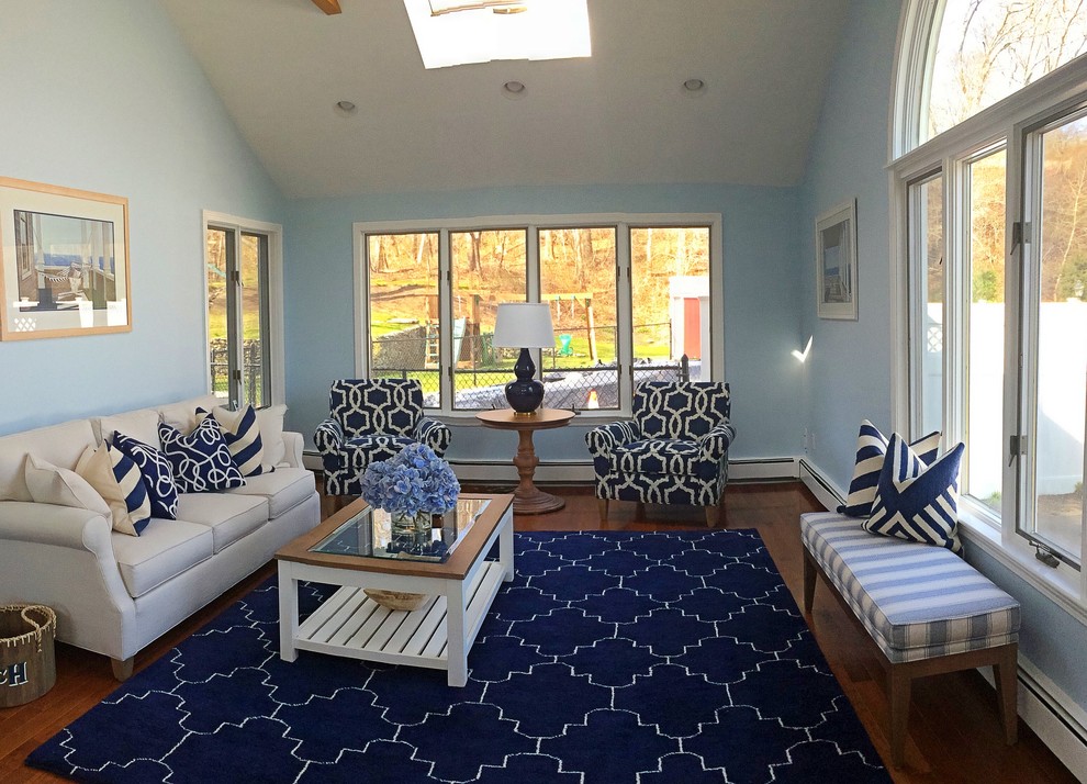 This is an example of a beach style family room in Boston.