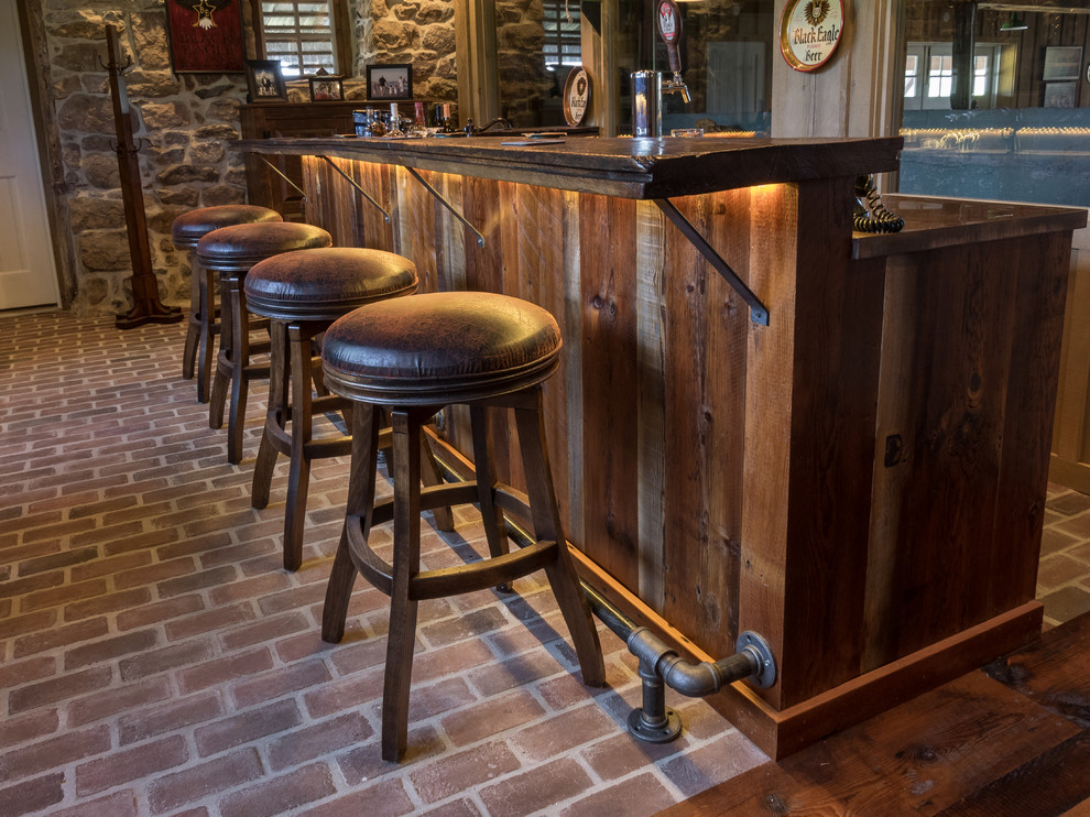Photo of a country home bar in Other.