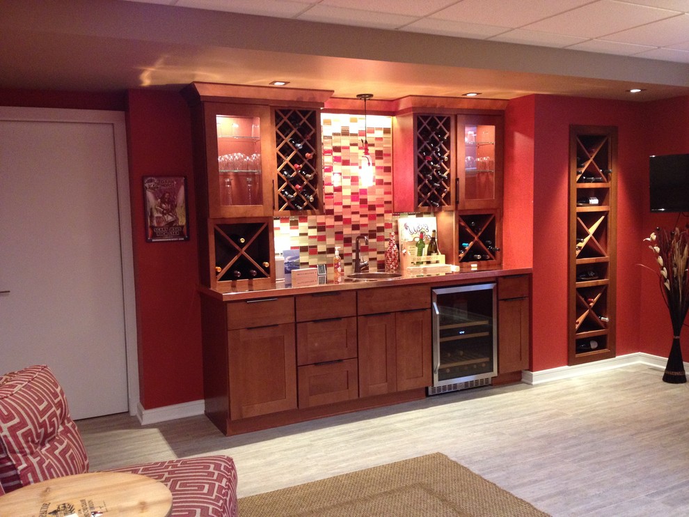 This is an example of a large transitional wine cellar in Other with diamond bins.