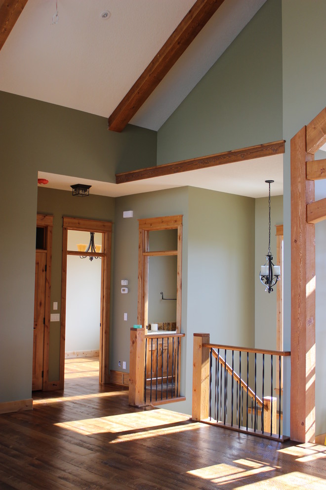 Example of a mountain style home design design in Calgary