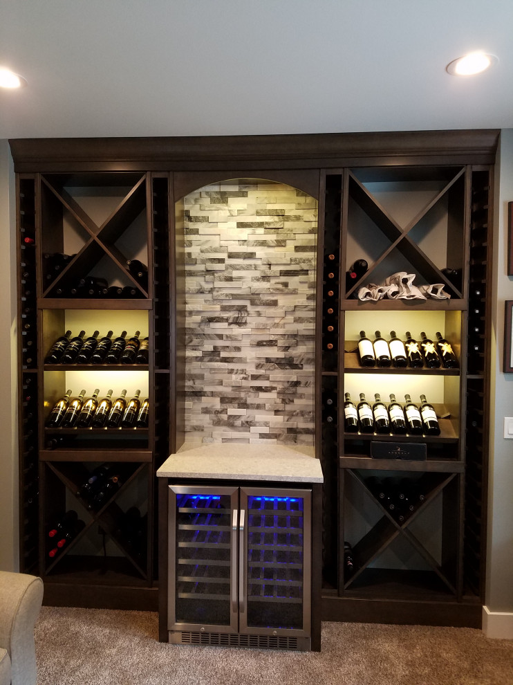Design ideas for a large traditional wine cellar in Seattle with display racks.