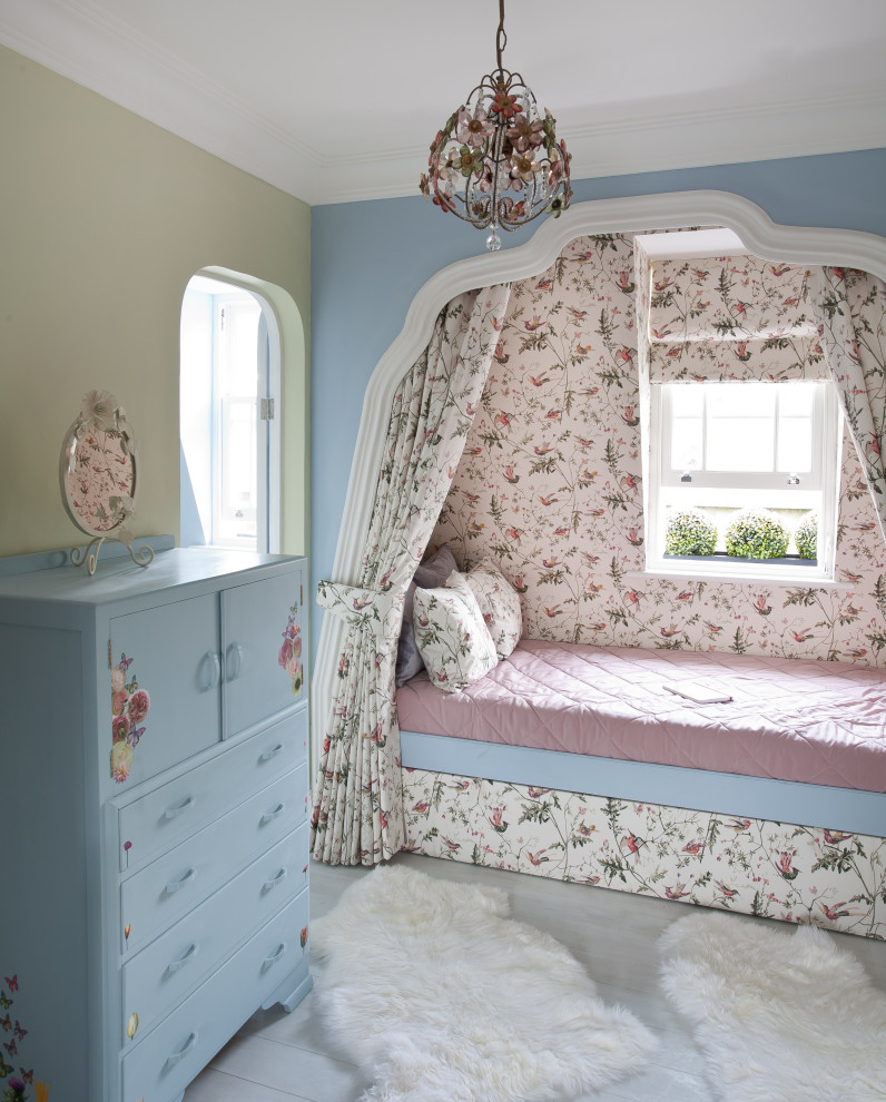 Design ideas for a mid-sized contemporary kids' bedroom for kids 4-10 years old and girls in London.