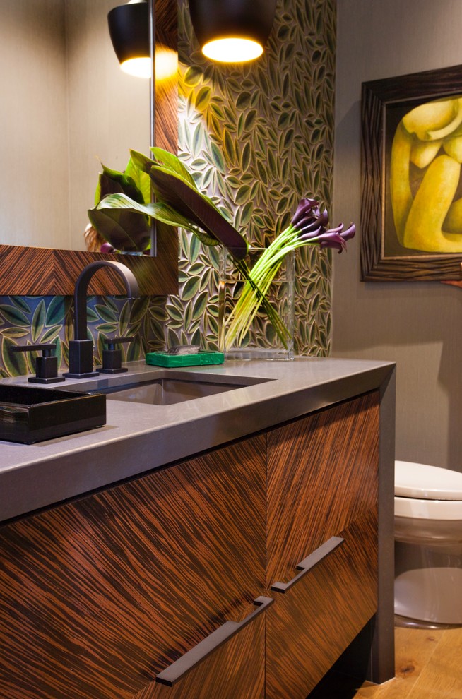 This is an example of a tropical powder room in San Diego.