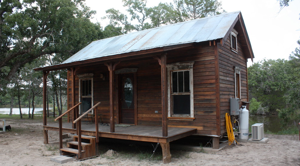 Example of an eclectic exterior home design in Austin