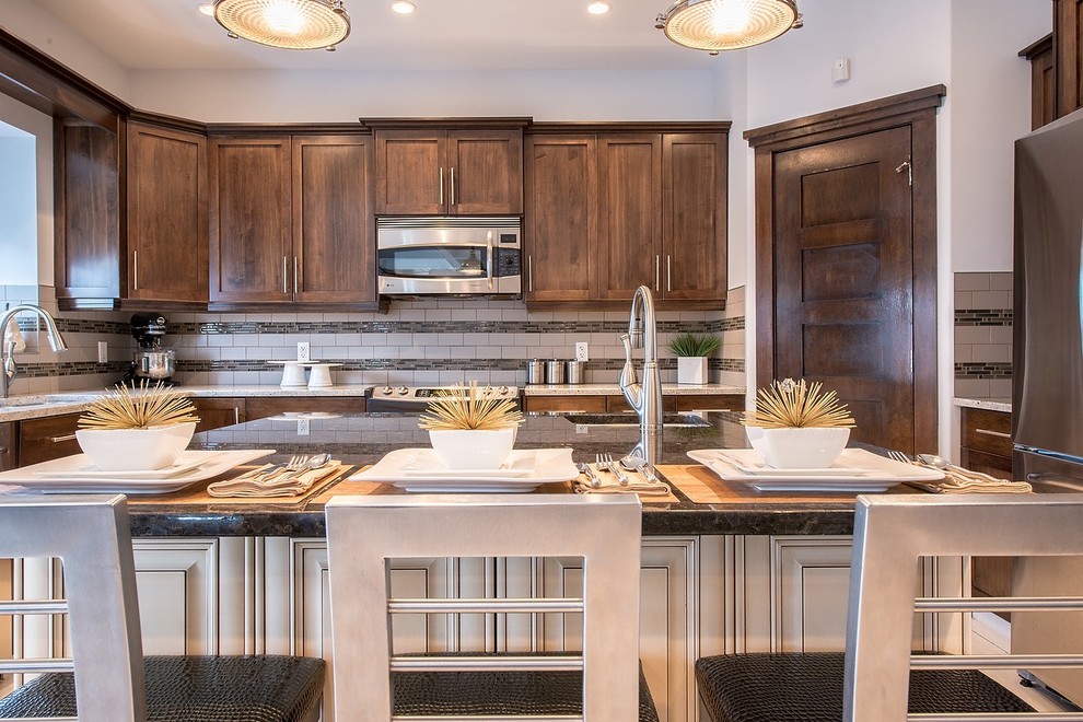 Example of a transitional kitchen design in Edmonton