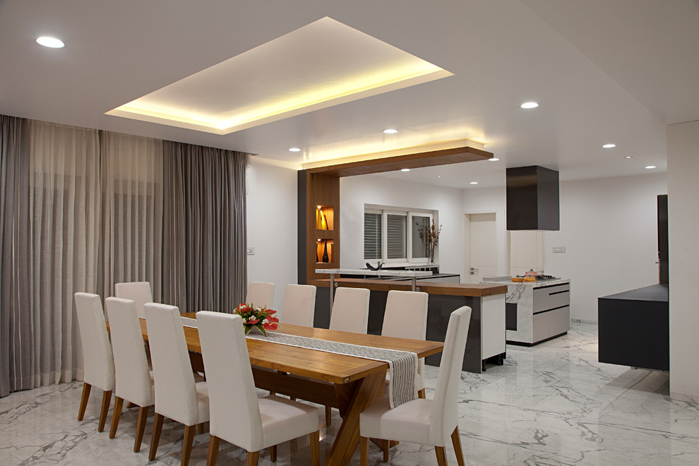 Photo of a modern dining room in Pune.