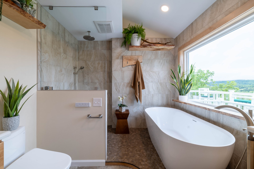 Bathroom - craftsman master beige tile brown floor and single-sink bathroom idea in Other with light wood cabinets, a bidet, beige walls, an undermount sink, white countertops and a niche