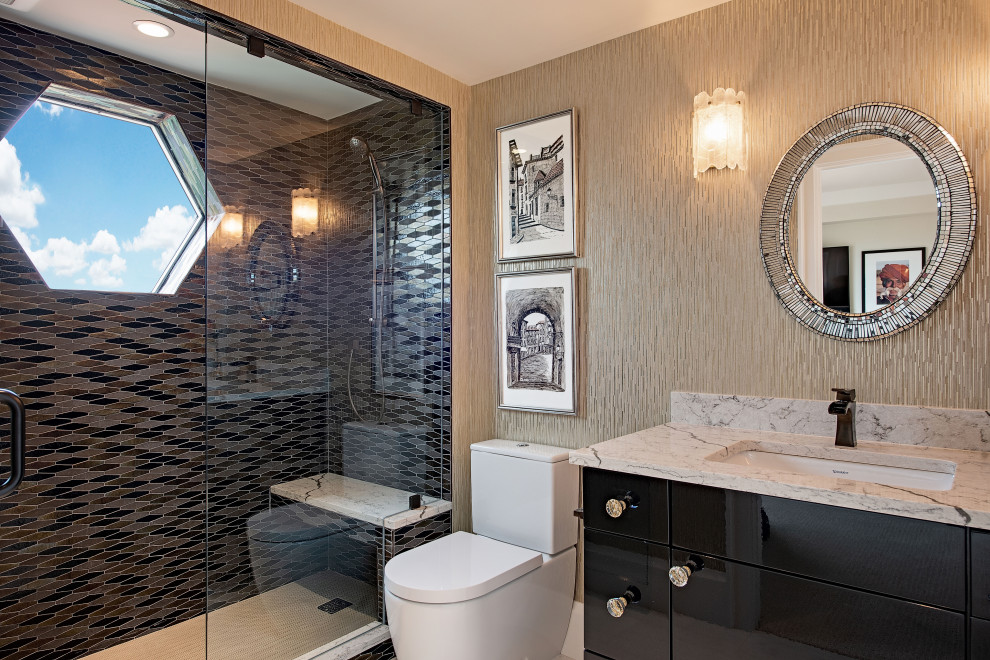 This is an example of a mid-sized contemporary 3/4 bathroom in Other with flat-panel cabinets, black cabinets, an alcove shower, a one-piece toilet, beige tile, matchstick tile, an undermount sink, a hinged shower door and grey benchtops.