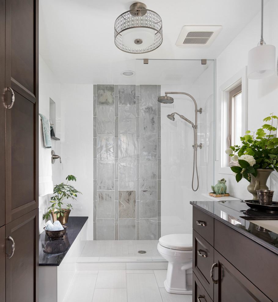 Mid-sized transitional master bathroom in Seattle with dark wood cabinets, an alcove shower, white tile, glass tile, white walls, porcelain floors, an undermount sink, grey floor, an open shower and grey benchtops.