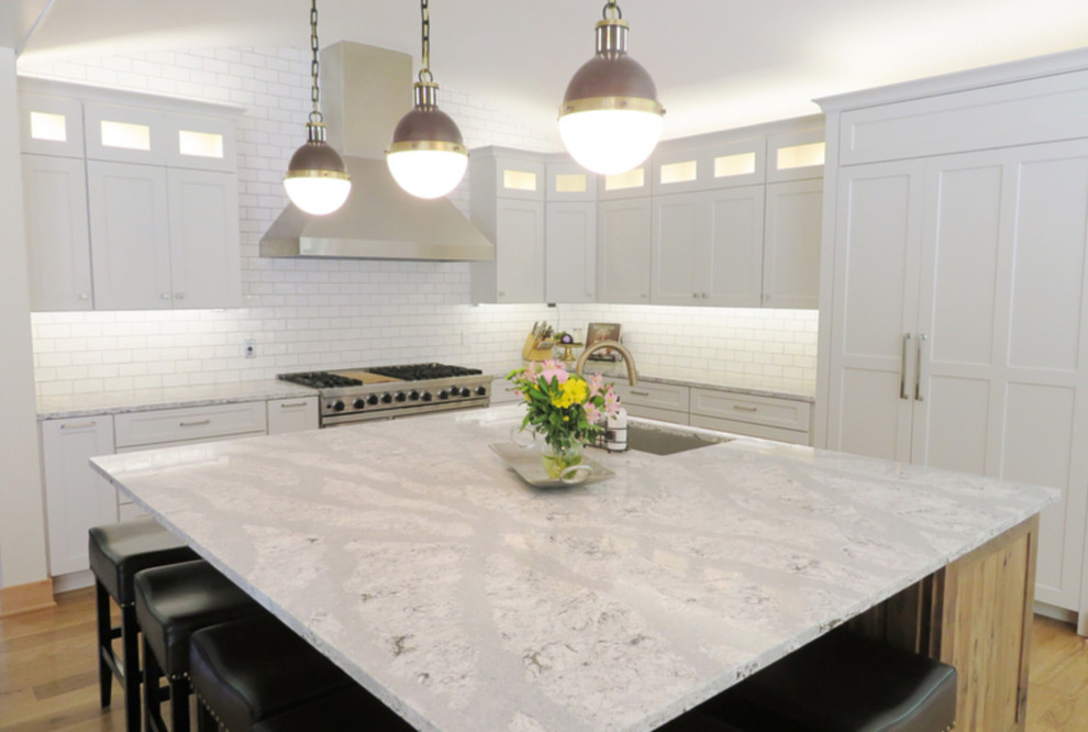 Kitchen - transitional kitchen idea with beaded inset cabinets and medium tone wood cabinets