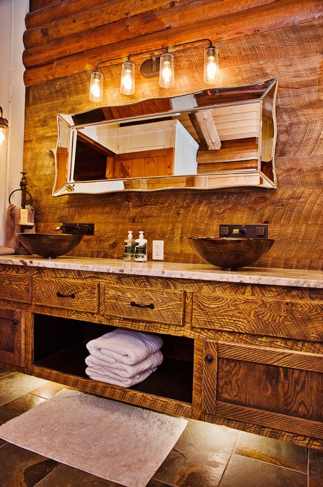 Alcove shower - mid-sized rustic 3/4 brown tile and ceramic tile ceramic tile and brown floor alcove shower idea with recessed-panel cabinets, dark wood cabinets, a two-piece toilet, brown walls, a vessel sink and granite countertops