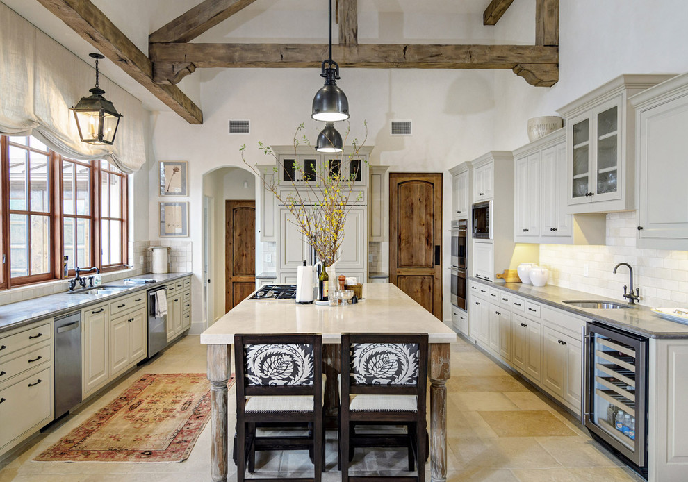 Photo of a country kitchen in Austin with panelled appliances.