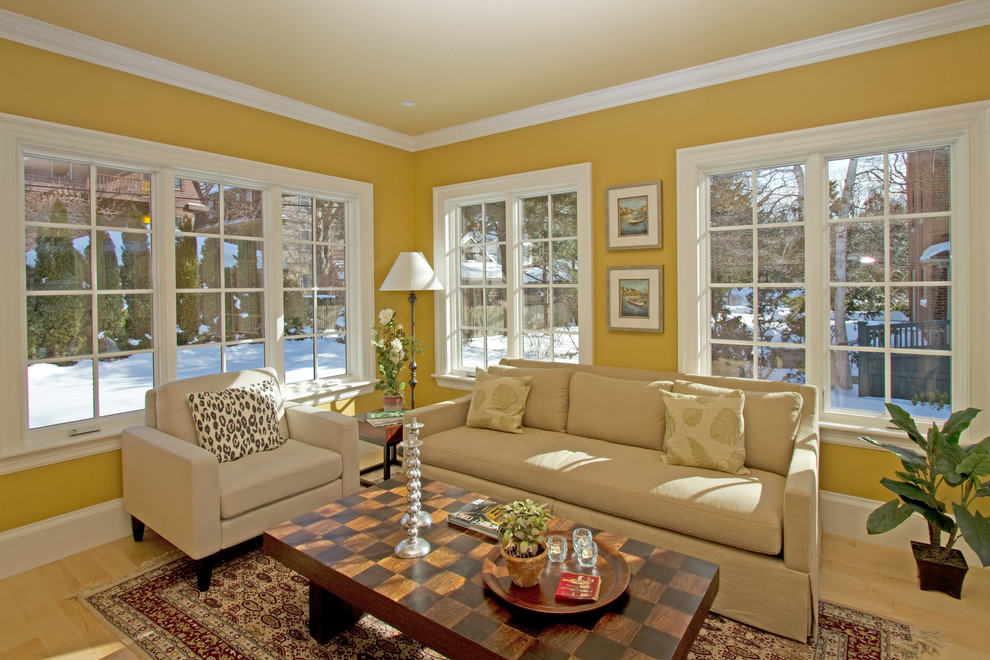 Design ideas for a transitional family room in Boston.
