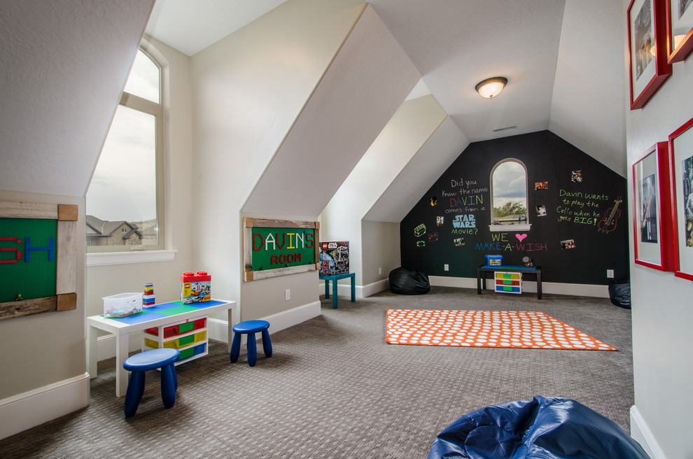 Large arts and crafts gender-neutral kids' playroom in Salt Lake City with grey walls and carpet.