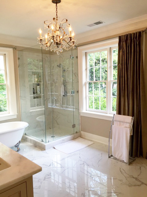 Design ideas for a large traditional master bathroom in Atlanta with recessed-panel cabinets, beige cabinets, a claw-foot tub, a corner shower, gray tile, white tile, ceramic tile, beige walls, marble floors, an undermount sink and granite benchtops.