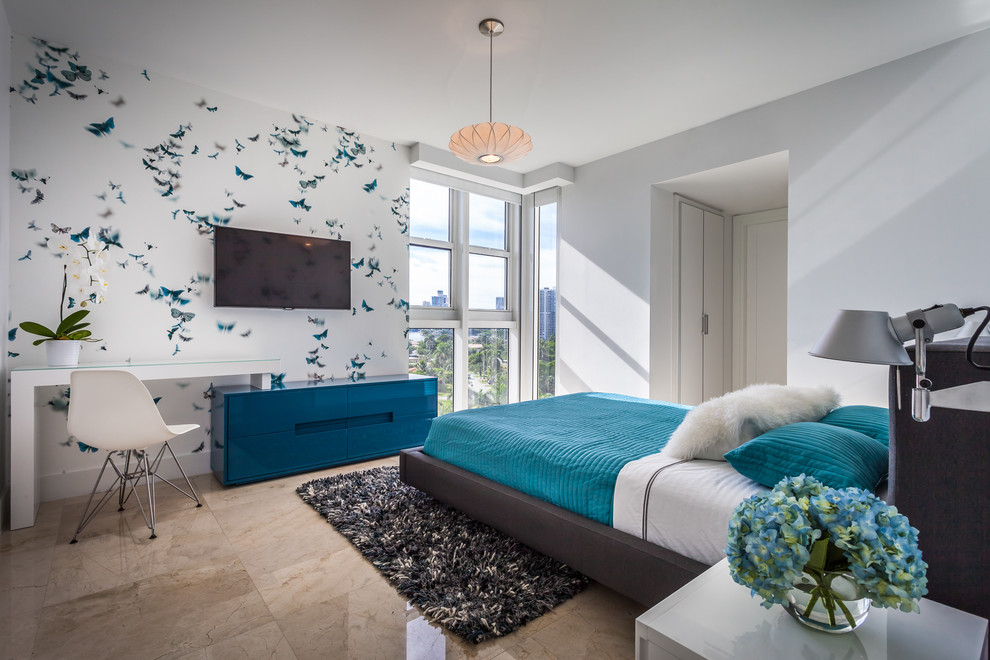 Photo of a contemporary bedroom in Miami with white walls.