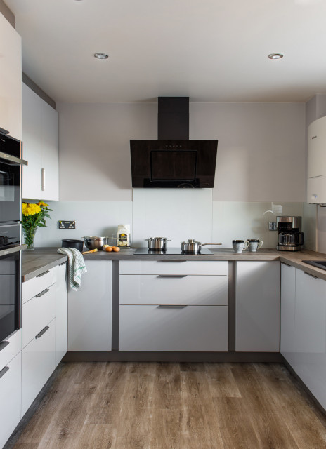Dust grey and ash panel high gloss compact kitchen. modern-kueche