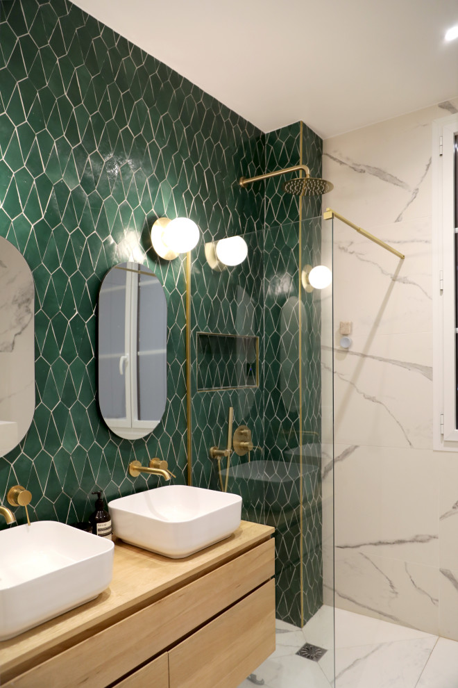 Inspiration for a small modern master bathroom in Paris with an open shower, a wall-mount toilet, green tile, cement tile, white walls, marble floors, a console sink, wood benchtops, white floor, an open shower and a double vanity.