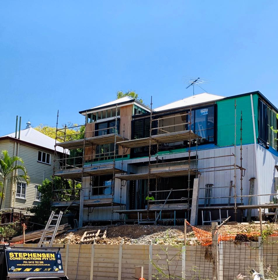 Well positioned on a high corner block, the rear view of this Taringa beauty is