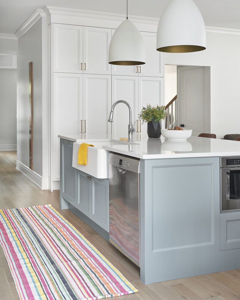 Example of a transitional kitchen design in Toronto