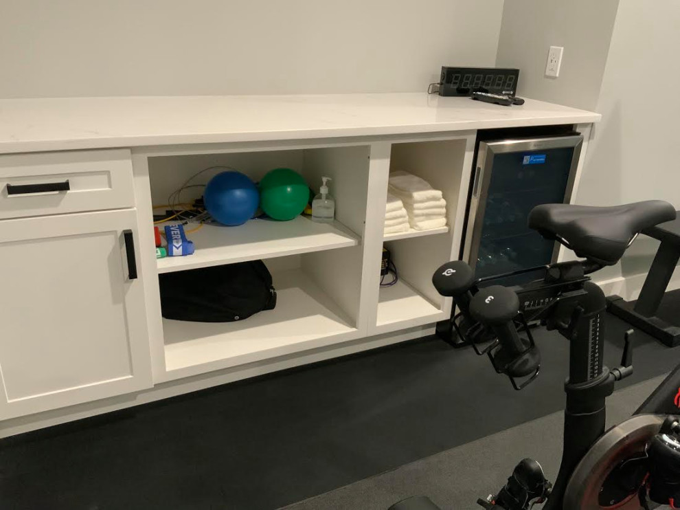 A Transitional Fun Family Basement with Bathroom, Gym, Movie Room and Gaming Ar