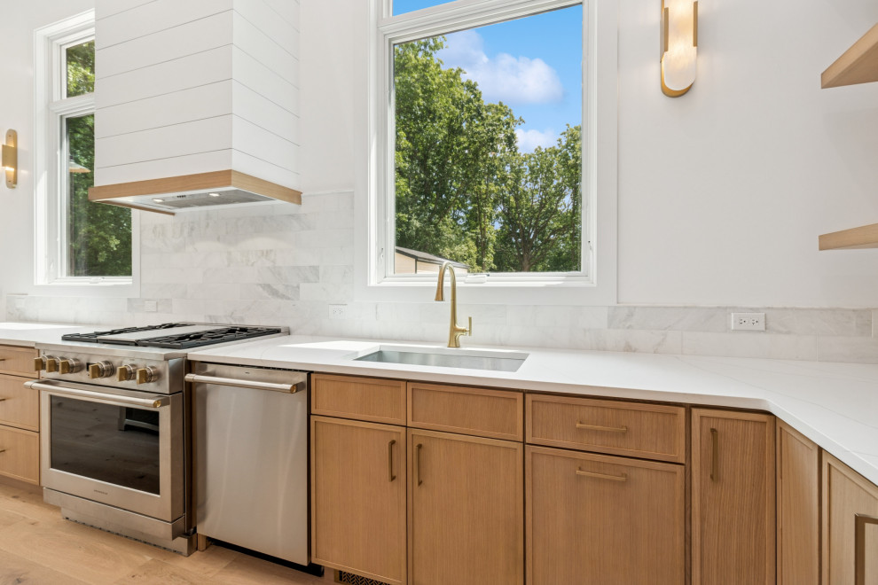 Light-Filled Kitchen With Shiplap Hood & Marble Backsplash