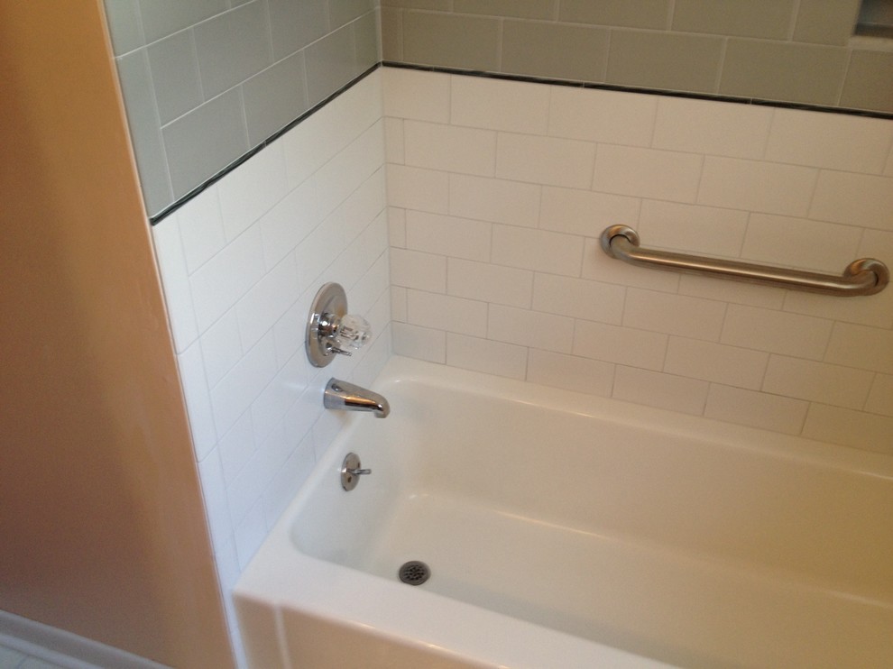 Drop-in bathtub - mid-sized kids' drop-in bathtub idea with beige walls