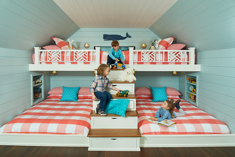 Beach House Bunk Room - In this formerly unfinished room above a garage, we were tasked with creating the ultimate kids’ space that could easily be used for adult guests as well. Our space was limited, but our client’s imagination wasn’t! Bold, fun, summertime colors, layers of pattern, and a strong emphasis on architectural details make for great vignettes at every turn.

With many collaborations and revisions, we created a space that sleeps 8, offers a game/project table, a cozy reading space, and a full bathroom. The game table and banquette, bathroom vanity, locker wall, and unique bunks were custom designed by Bayberry Cottage and all allow for tons of clever storage spaces.

This is a space created for loved ones and a lifetime of memories of a fabulous lakefront vacation home!