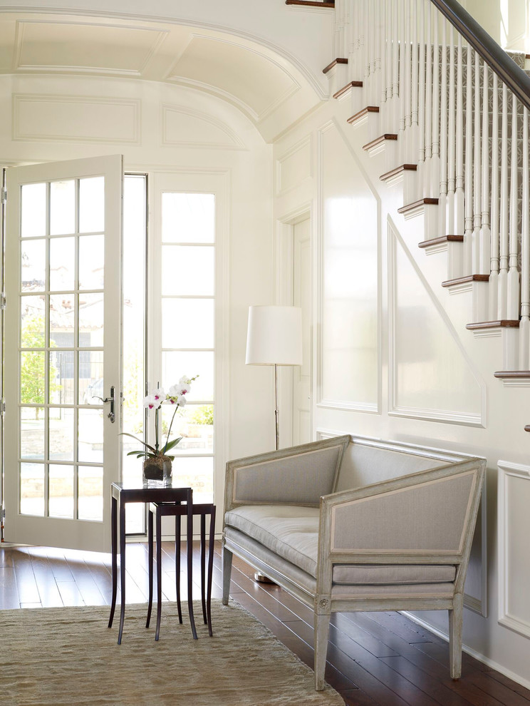 Inspiration for a traditional foyer in Houston with a single front door, a white front door and white walls.