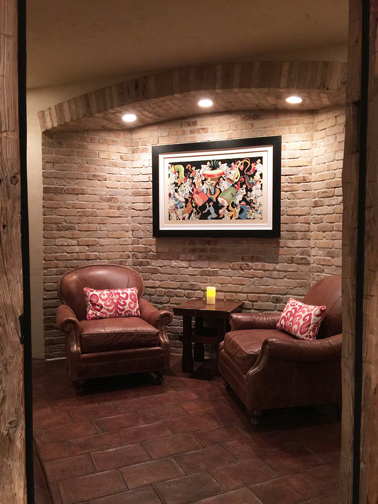 Photo of a mid-sized country wine cellar in Chicago with terra-cotta floors and brown floor.