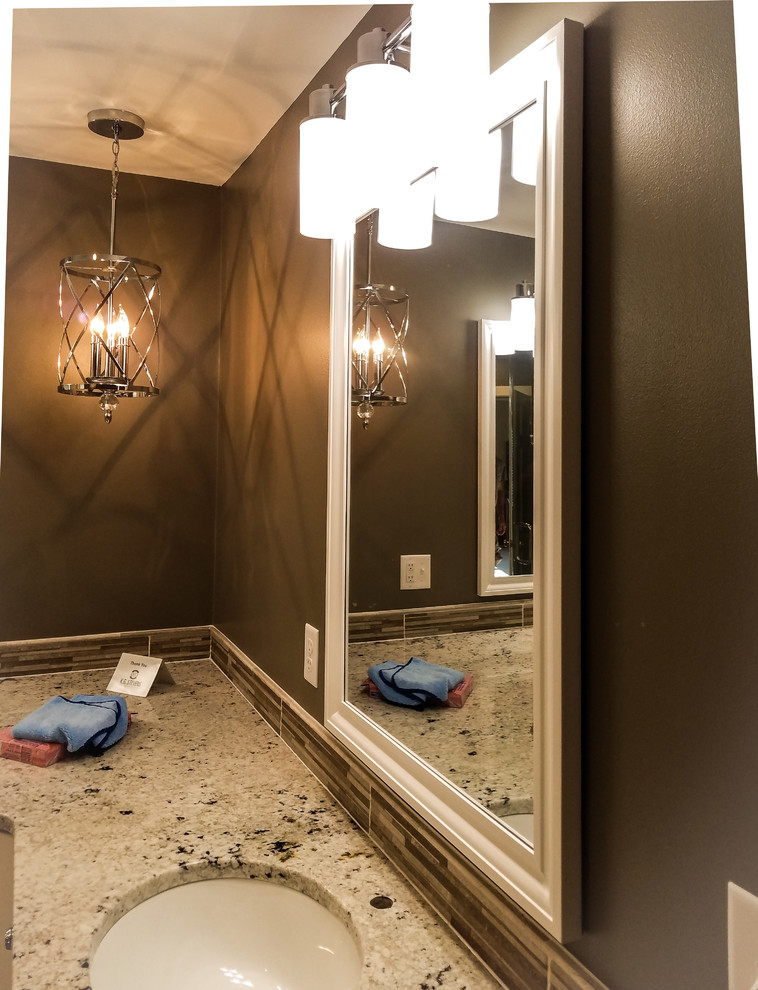 Large transitional master multicolored tile and ceramic tile porcelain tile and gray floor freestanding bathtub photo with shaker cabinets, white cabinets, a two-piece toilet, gray walls, an undermount sink, granite countertops and a hinged shower door