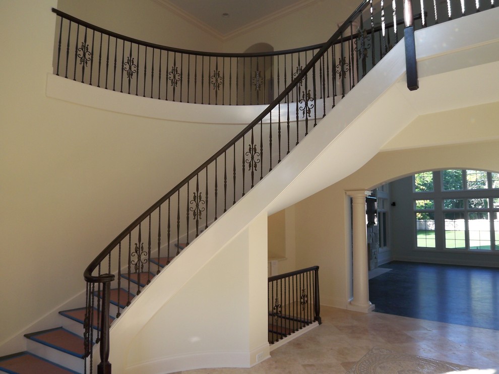 Inspiration for a transitional staircase in Denver.