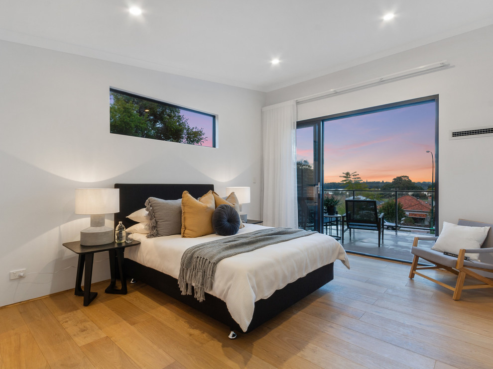 This is an example of a large contemporary bedroom in Perth.