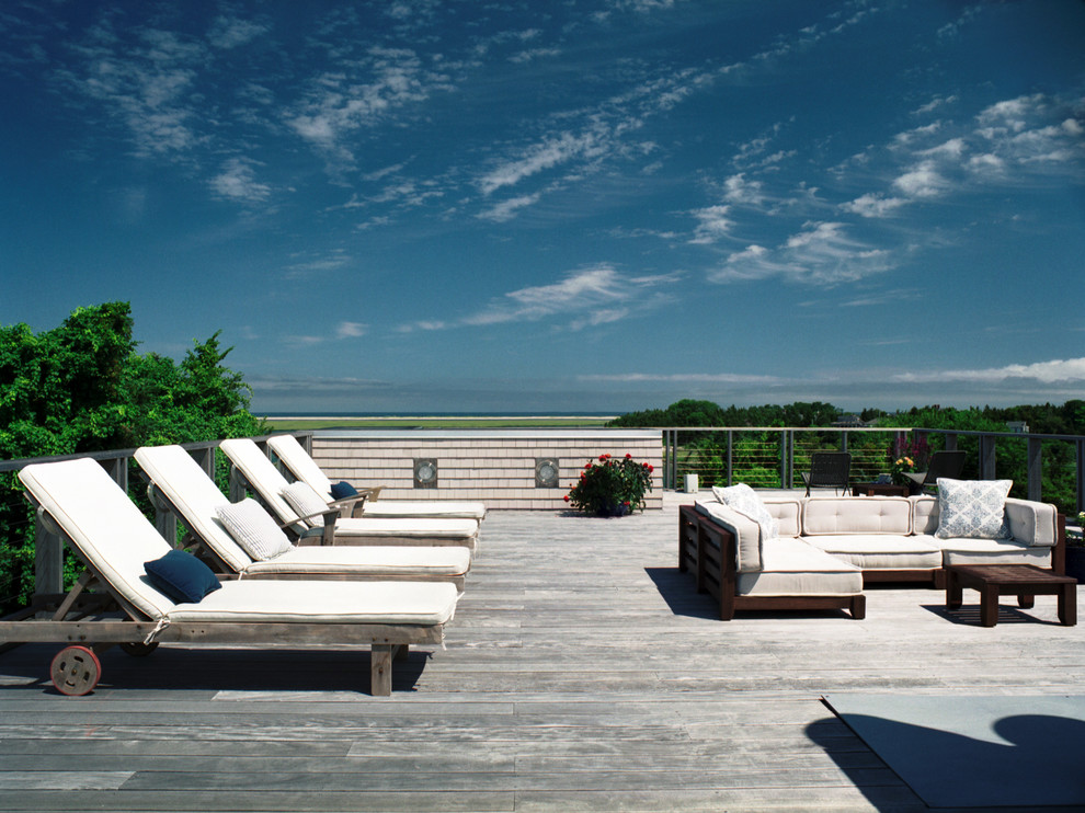 Photo of a beach style deck in Boston.