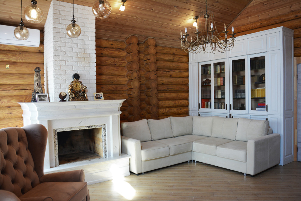 Mid-sized traditional living room in Other with a library, porcelain floors, a standard fireplace, a stone fireplace surround, a wall-mounted tv, timber and wood walls.