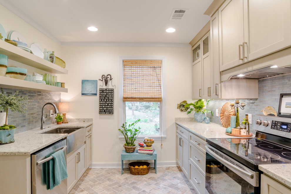 Small transitional galley separate kitchen in Miami with a farmhouse sink, shaker cabinets, beige cabinets, quartz benchtops, blue splashback, glass tile splashback, stainless steel appliances, porcelain floors and no island.