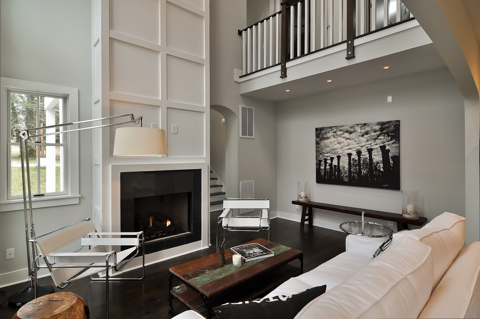 This is an example of a contemporary living room in Nashville with grey walls.