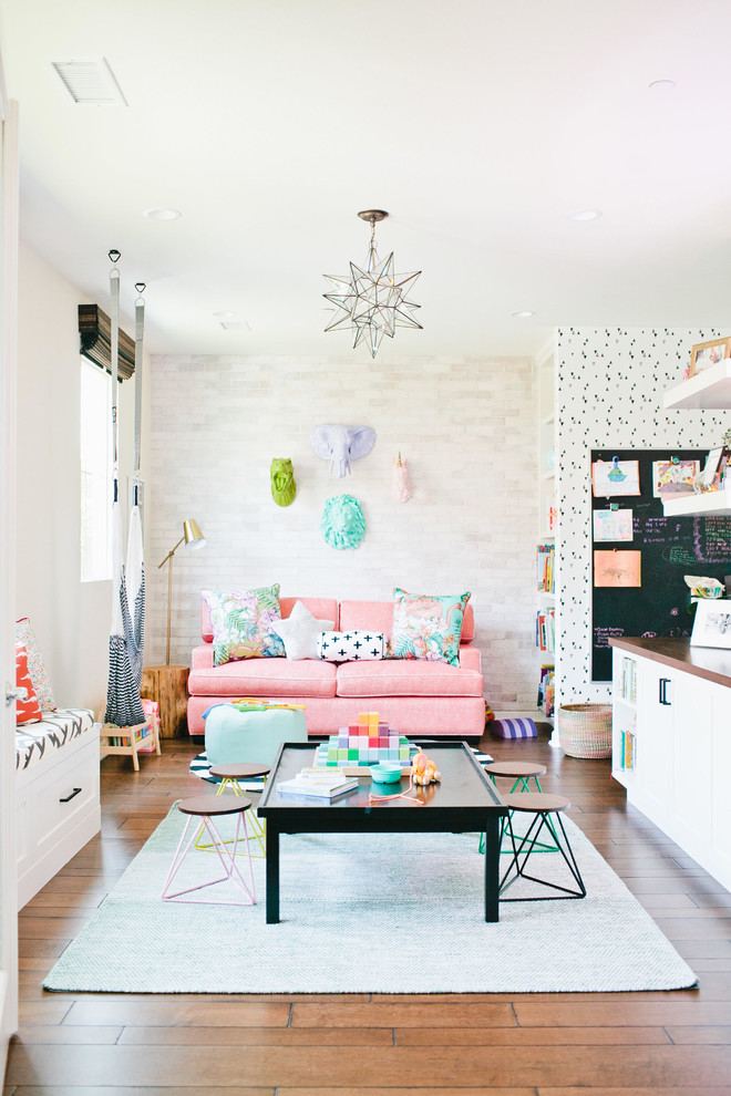 Inspiration for a transitional kids' playroom for kids 4-10 years old and girls in Salt Lake City with multi-coloured walls, dark hardwood floors and brown floor.