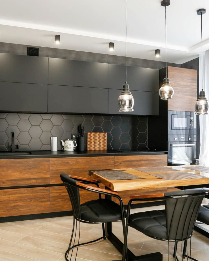 Photo of a mid-sized contemporary single-wall eat-in kitchen in Moscow with a drop-in sink, flat-panel cabinets, dark wood cabinets, solid surface benchtops, black splashback, stone slab splashback, coloured appliances, ceramic floors, no island, beige floor, black benchtop and recessed.