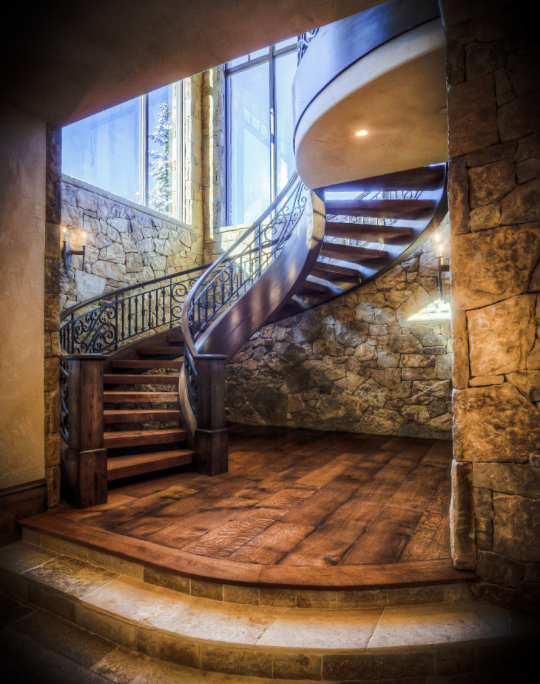 Design ideas for a country wood staircase in Salt Lake City with metal railing.