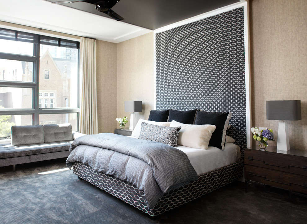 Inspiration for a contemporary bedroom in Chicago with beige walls and carpet.