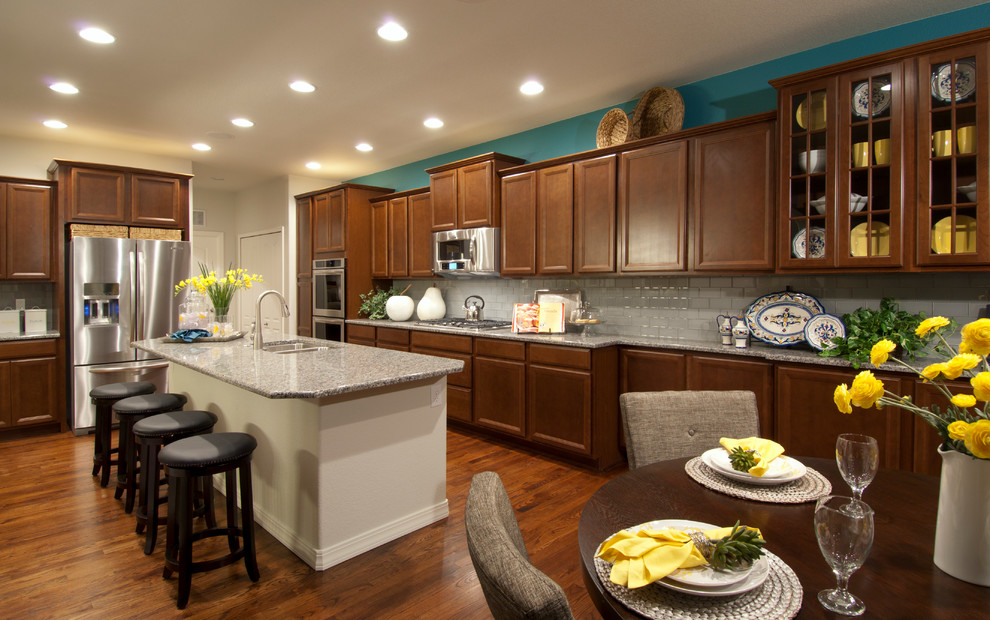 Design ideas for a traditional kitchen in Denver with granite benchtops and stainless steel appliances.