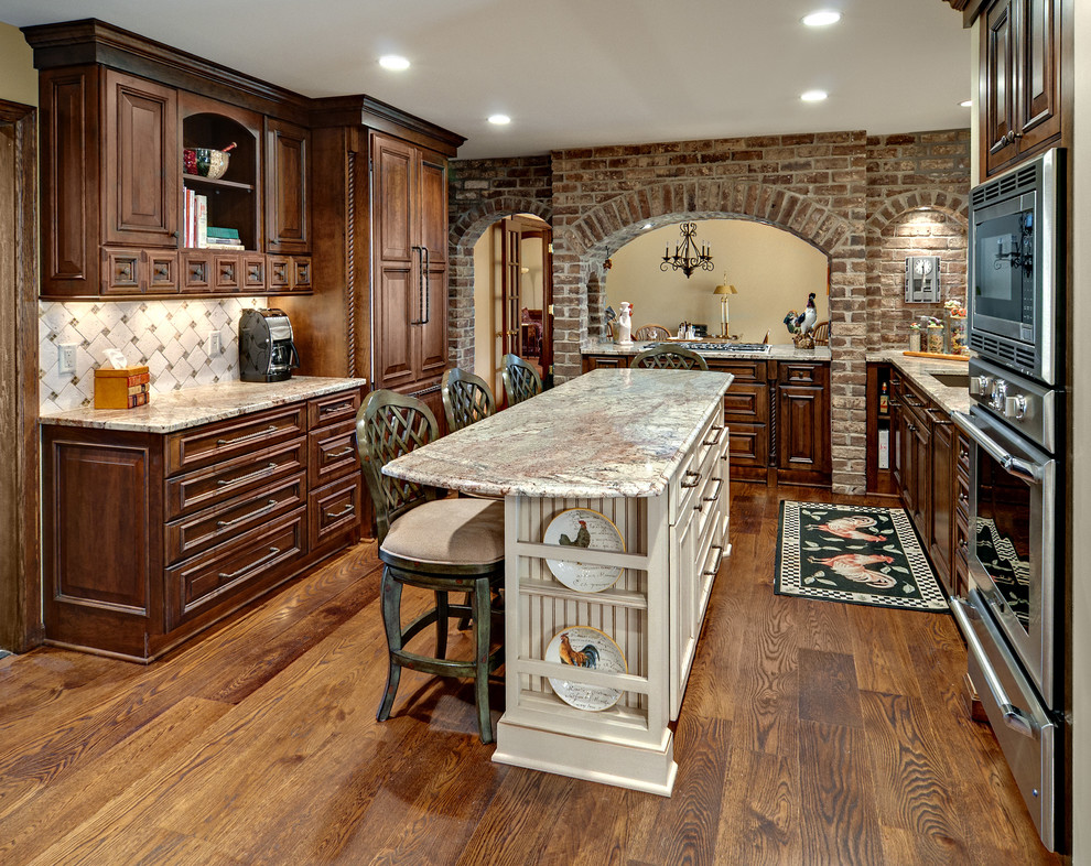 Design ideas for a country kitchen in Minneapolis with stainless steel appliances and granite benchtops.