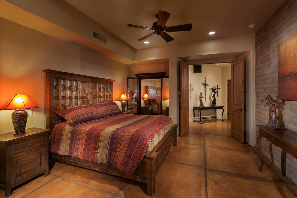 This is an example of a large traditional master bedroom in Phoenix with beige walls.