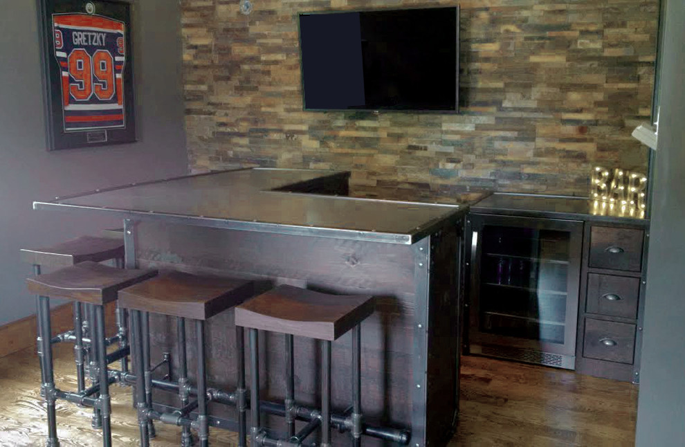 Industrial l-shaped home bar in Other with dark wood cabinets and wood benchtops.