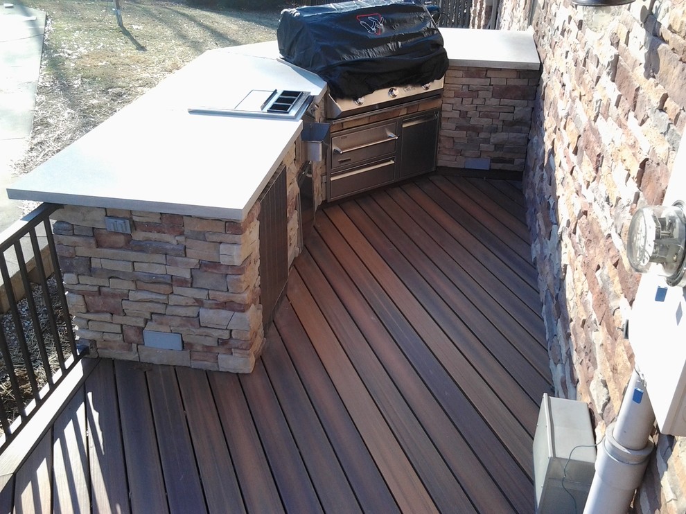 Design ideas for a large arts and crafts backyard deck in Indianapolis with an outdoor kitchen and no cover.