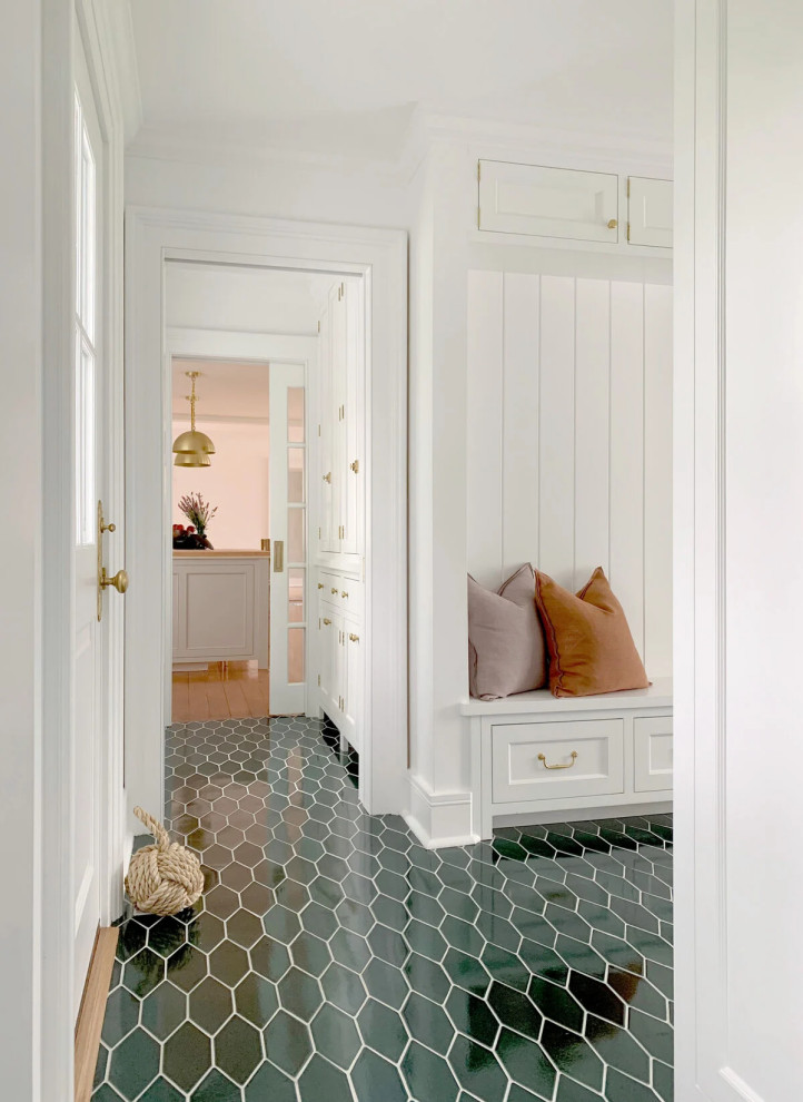 Photo of a medium sized farmhouse foyer in New York with ceramic flooring and green floors.